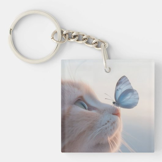 Schattige kat en blauwe vlinder sleutelhanger (voorkant)