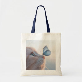Schattige kat en blauwe vlinder tote bag