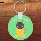 Schattige kat in theekopje cartoon op mintgroen sleutelhanger (Voorkant)