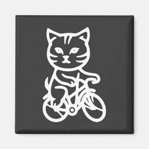 Schattige kat rijdt op een fiets magneet