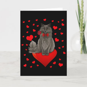 Schattige kat zittend op groot hart kaart