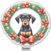 Schattige kerst doberman pup in feestelijke krans sticker (Voorkant)
