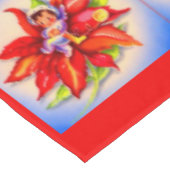 schattige kerstelf in een poinsettia tafelkleed (Gekanteld)