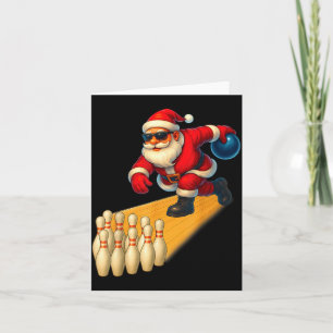 Schattige Kerstman speelt met bowlingbal en Ns-bow Kaart