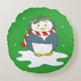 Schattige kerstpinguïn rond kussen