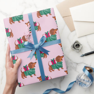 Schattige Kerstwienerhond in Groene Trui Roze Cadeaupapier