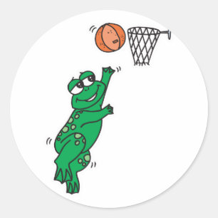 schattige kikker die basketbal schiet ronde sticker