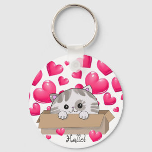 Schattige kitten in een doos en roze harten sleutelhanger