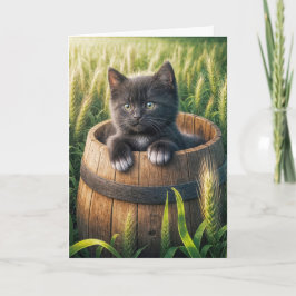Schattige kitten in een houten vat kaart