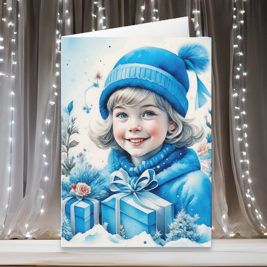 Schattige klein meisje in blauw kerst kaart