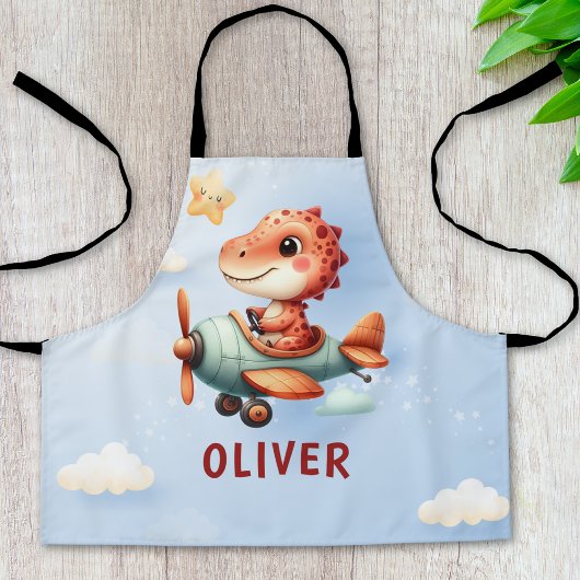 Schattige klein piloot dinosaurus vliegend vliegtu schort