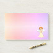 Schattige kleine engel op pastelkleuren post-it® notes (Op bureau)