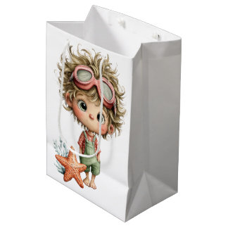 SCHATTIGE KLEINE ZOMERJONGEN MET ZEESTER MEDIUM CADEAUZAKJE