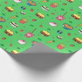 Schattige kleurrijk voedingspatroon op groen cadeaupapier (Hoek)