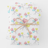 schattige, kleurrijke hartenpootjes inpakpapier vel (In situ)