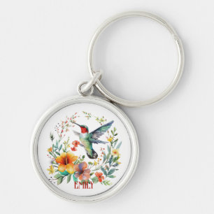 Schattige kleurrijke kolibrie en bloemen sleutelhanger