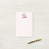 Schattige konijnen delen een hart post-it® notes (Op bureau)