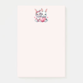 Schattige konijnen delen een hart post-it® notes