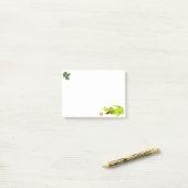 Schattige krokodil & gemerkte laurierbladeren op w post-it® notes (Op bureau)