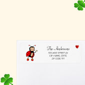 Schattige lieveheersbeestje en hart op wit etiket