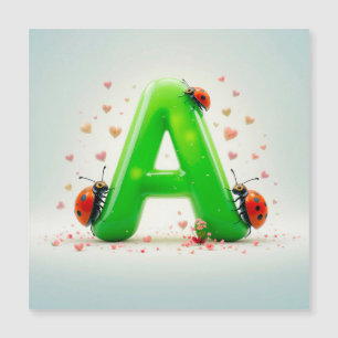 Schattige lieveheersbeestjes op groene letter A