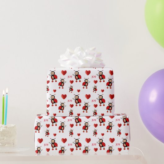 Schattige lieveheersbeestjes op wit cadeaupapier (Feestgeschenken)
