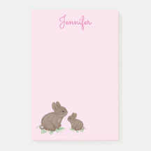 Schattige mama en baby konijn in klaver roze