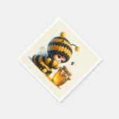 Schattige meisje in bijenkostuum met honing servet (Hoek)