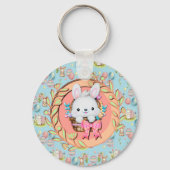 Schattige paashaas zitten in de mand sleutelhanger (Voorkant)