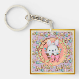 Schattige paashaas zitten in de mand sleutelhanger