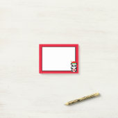 Schattige pandabeer elfenstrip op rood en wit post-it® notes (Op bureau)