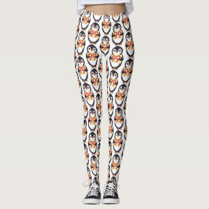 Schattige pinguïn die een bord vasthoudt met het n leggings