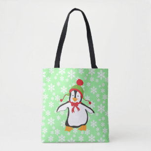 Schattige pinguïn met sneeuwvlok achtergrond tote bag