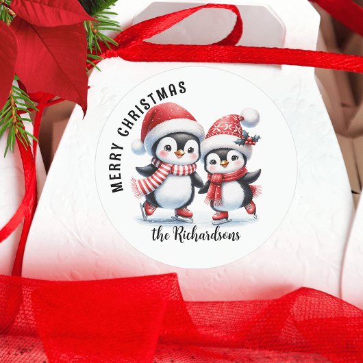 Schattige pinguïns schaatsen vrolijk kerstfeest ronde sticker