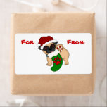 Schattige Pug Puppy Christmas Gift Label<br><div class="desc">Dit Holiday cadeau label label heeft een schattige bruine en zwarte puppy met een rood Sinterklaas pet en een groene kous in zijn bek. De kous heeft een rode pootafdruk. Aan weerszijden van het afbeelding is een gebied om te schrijven voor wie het geschenk is en van wie het is....</div>