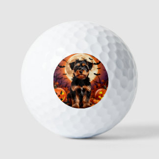 Schattige puppy met Halloween achtergrond Golfballen