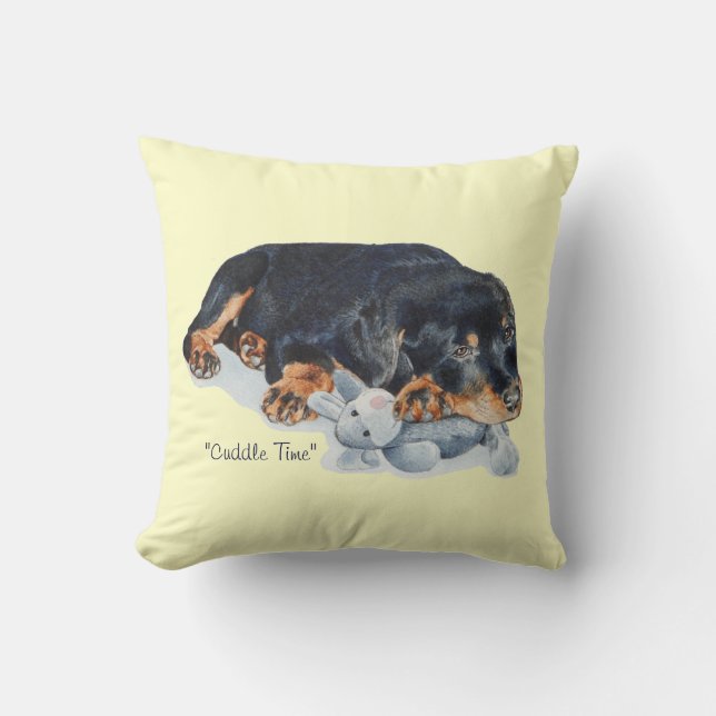 schattige rottweiler puppy dog snuffelend teddybee kussen (Voorkant)