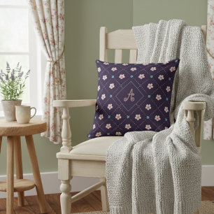 Schattige roze en blauw bloempatroon op Paarse Kussen