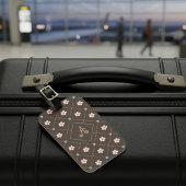 Schattige roze en blauw bloemplakt op bruin bagagelabel