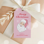 Schattige Roze  Santa Christmas Gift Label Cadeaulabel<br><div class="desc">Dit schattige cadeau label heeft een vrolijk kerstmangezicht op een roze achtergrond die u kunt personaliseren met uw persoonlijke of familienaam. De rug heeft een sneeuwvlokpatroon. Dit kerstcadeau label is een leuke manier om te zeggen BEDANKT voor het komen naar uw kerst of vakantie thema feest! Bevestig het label eenvoudig...</div>