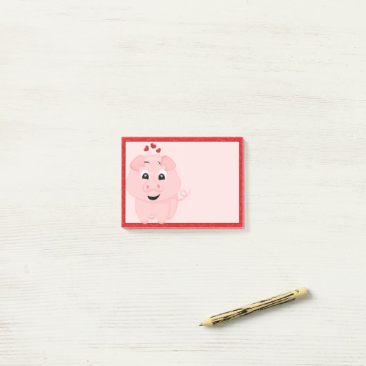 Schattige roze varken en harten post-it® notes (Op bureau)