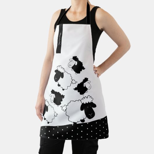 Schattige schaap op zwart en wit schort (Insitu)