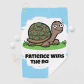 Schattige schildpadgeduld wint de ronde golfhanddoek (Insitu)