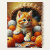 Schattige Sinaasappel en witte kitten spelen in ga Planner (Achterkant)