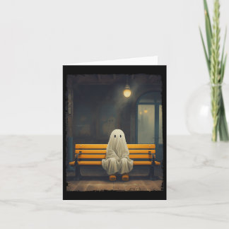 Schattige spook wachten zittend op stoel hallow Kaart