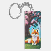 Schattige vos zit onder de boom sleutelhanger (Voorkant Links)
