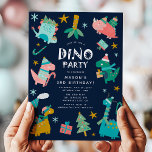 Schattige Winter Kerstmis Dino Kids Verjaardagsfee Kaart<br><div class="desc">Vier de verjaardag van uw kind met onze kerst Winter Dino Party uitnodigingen! Dit schattige verjaardagsfeestontwerp heeft een lijst kleurrijke dinosaurussen, gekleed in petten en sjaals met geschenken en uw aangepaste feestdetails in een moderne typografie tegen een marineblauwe achtergrond. Personaliseer de uitnodigingen voor verjaardagsfeestjes door de naam en de feestgegevens...</div>