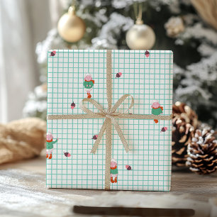Schattige winter schapen en eikels op een mintgroe cadeaupapier