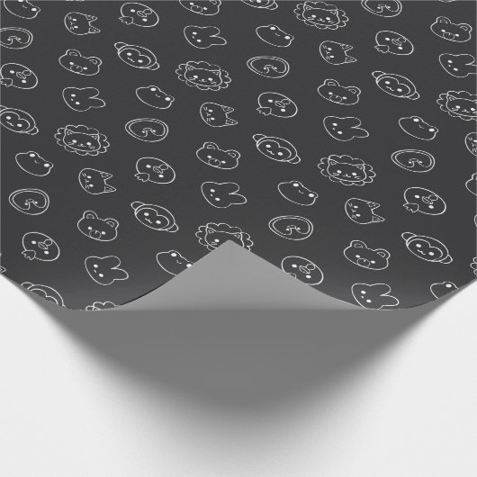 Schattige wit dierenhoofd doedels op zwart cadeaupapier (Hoek)