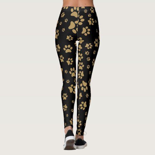 Schattige zwart en oud gouden pootafdrukpatroon af leggings (Achterkant)